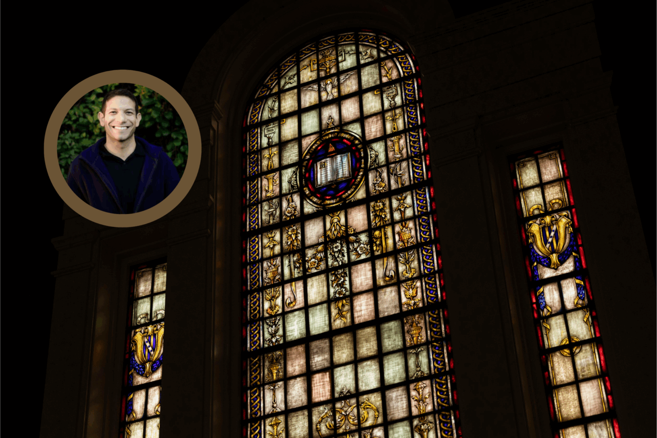 A picture of the writer superimposed on a dark moody photograph of a stained glass window