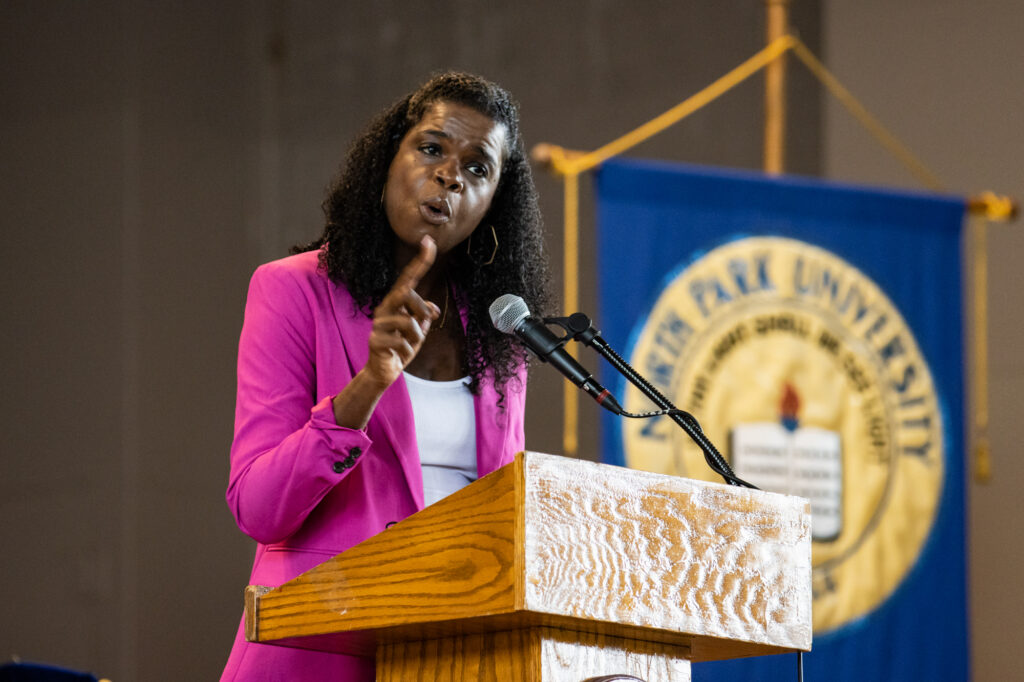 Kim Foxx speaking at podium