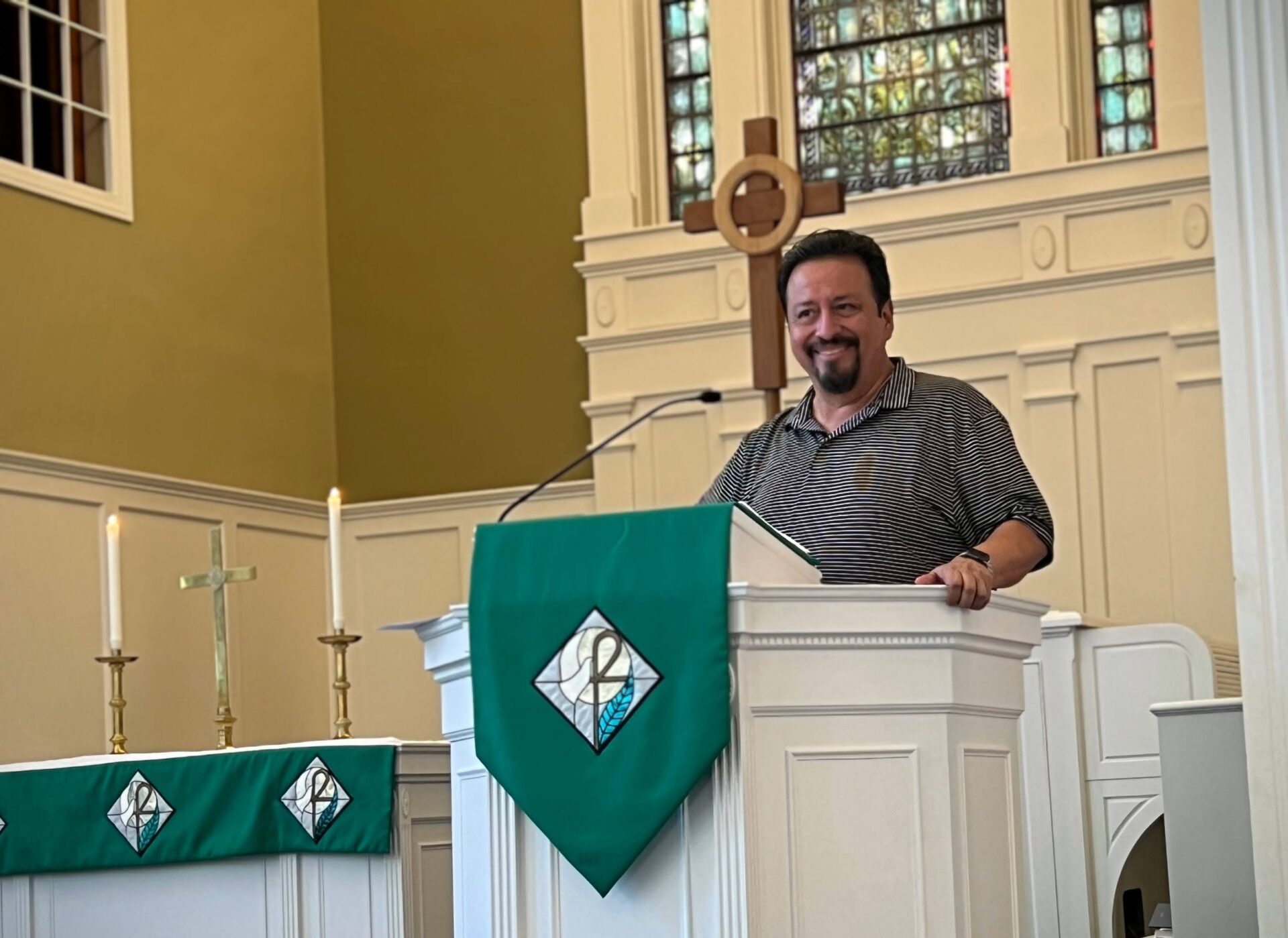 Man at chapel podium