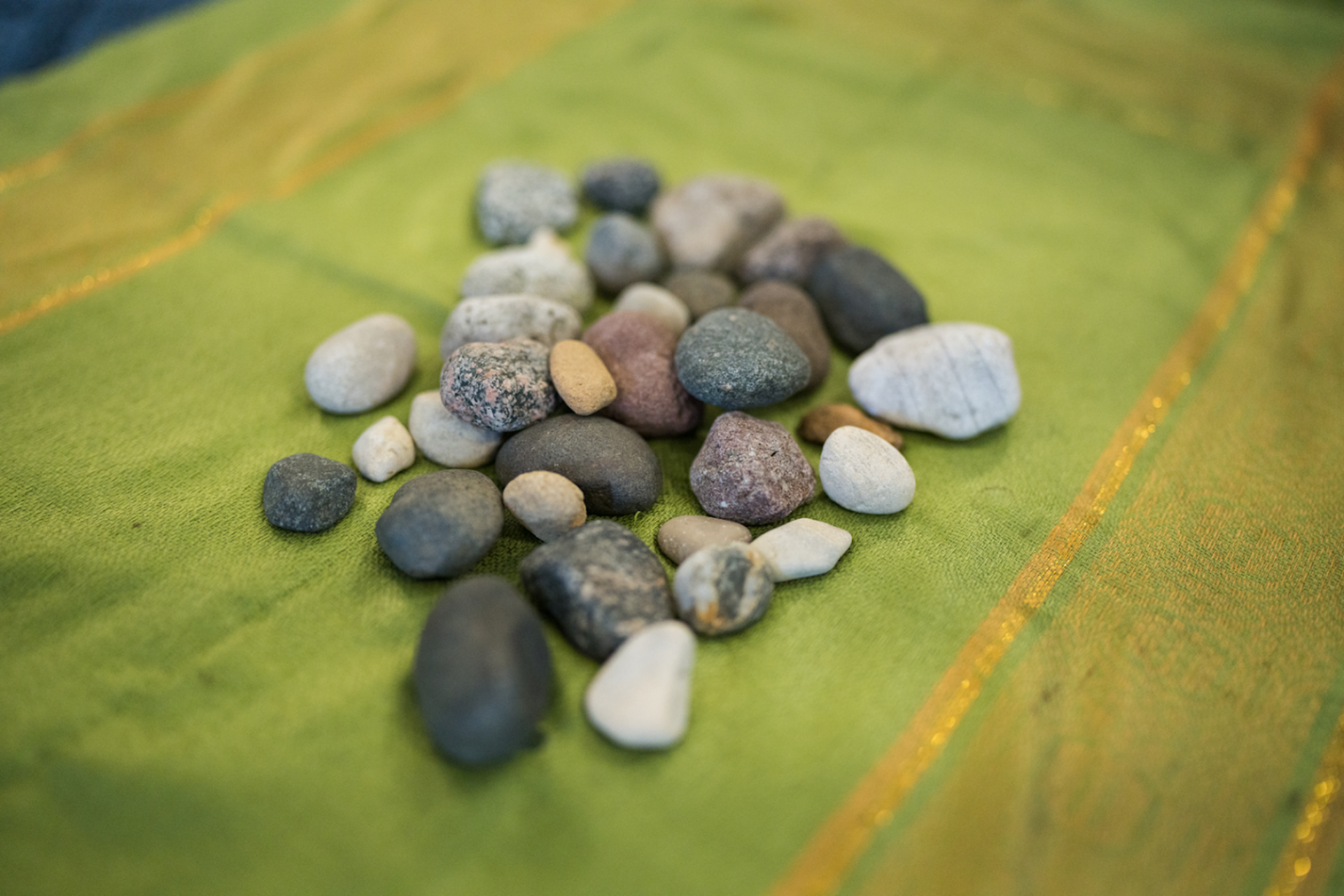 Rocks on altar demonstrate lived experiences