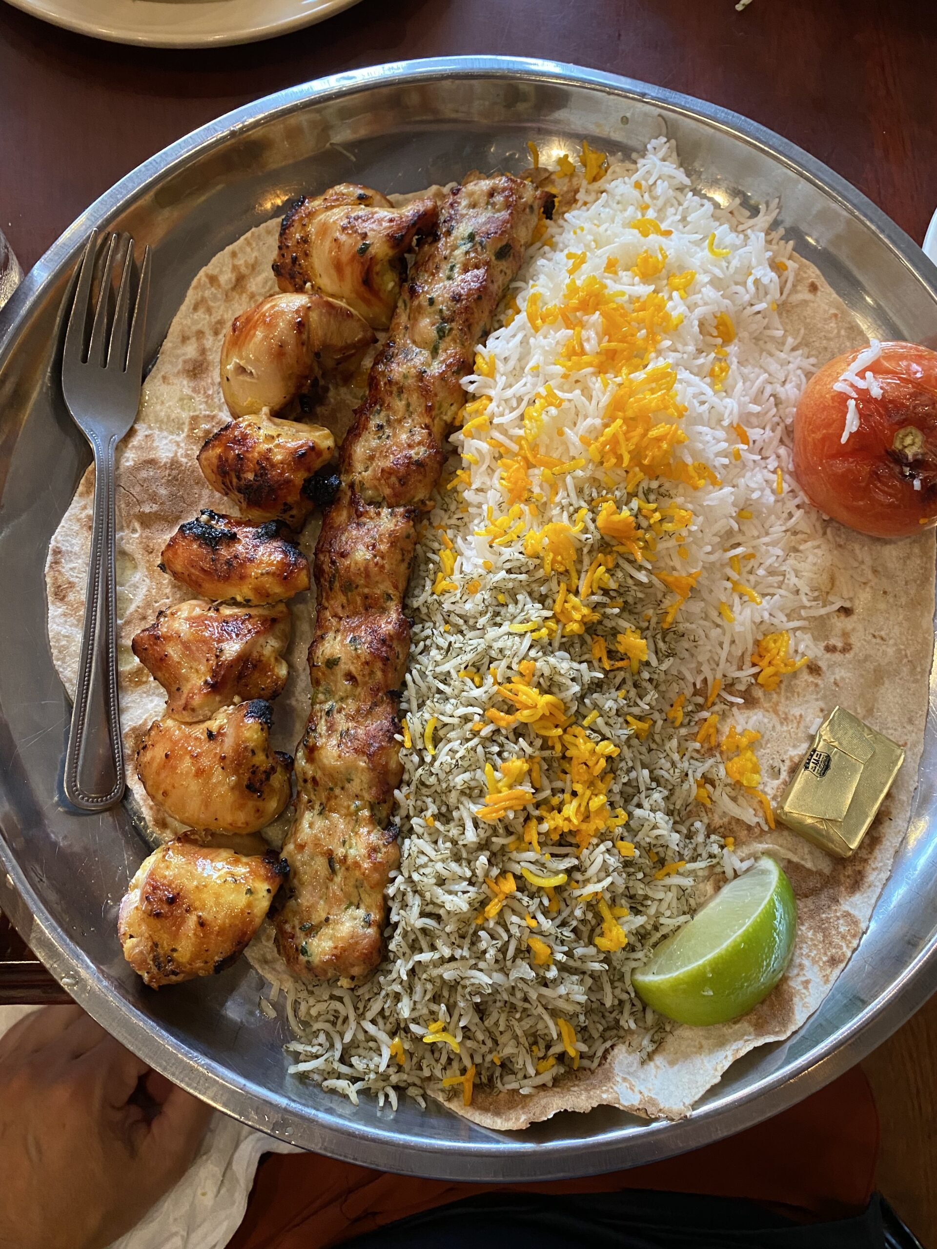 Dish of Lebanese kabobs and rice at a local Albany Park restaurant