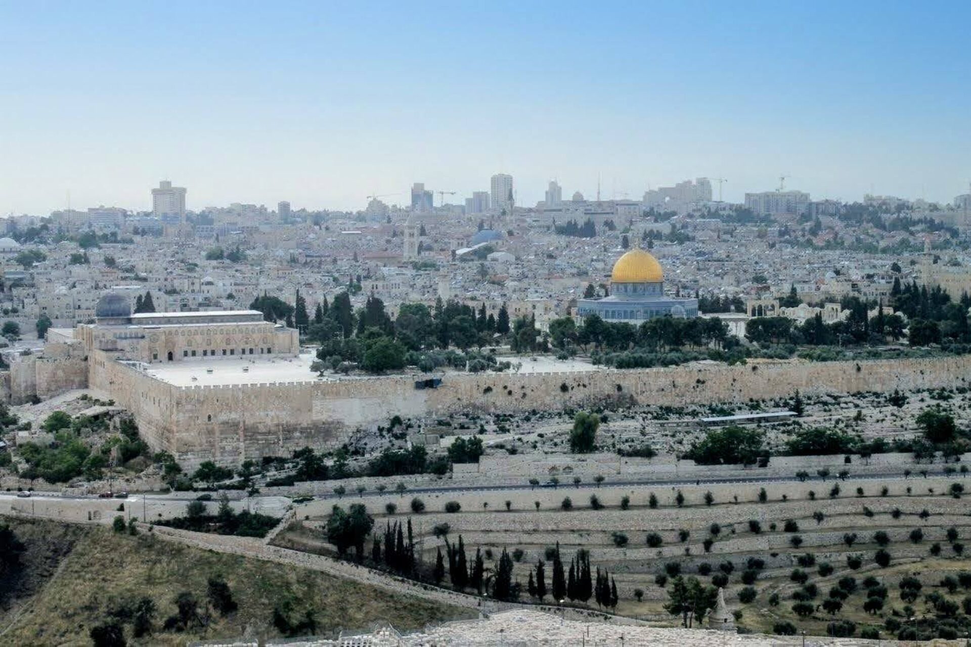 Modern Jerusalem with the white buildings and golden temple mount visible