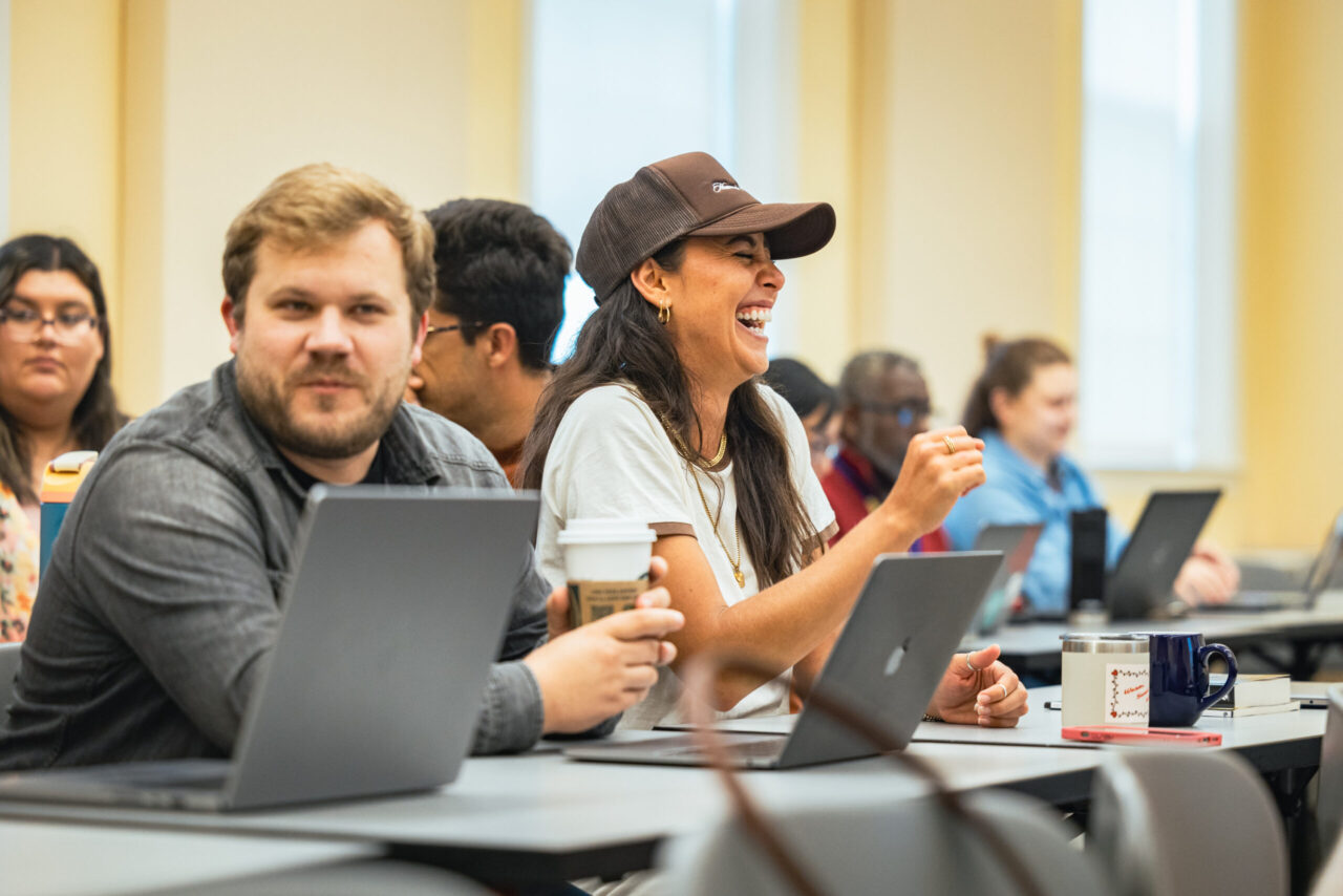 seminary students laugh before class