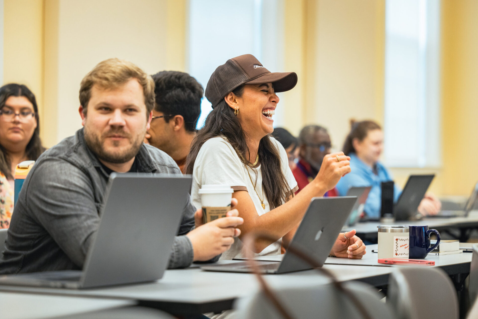 seminary students laugh before class