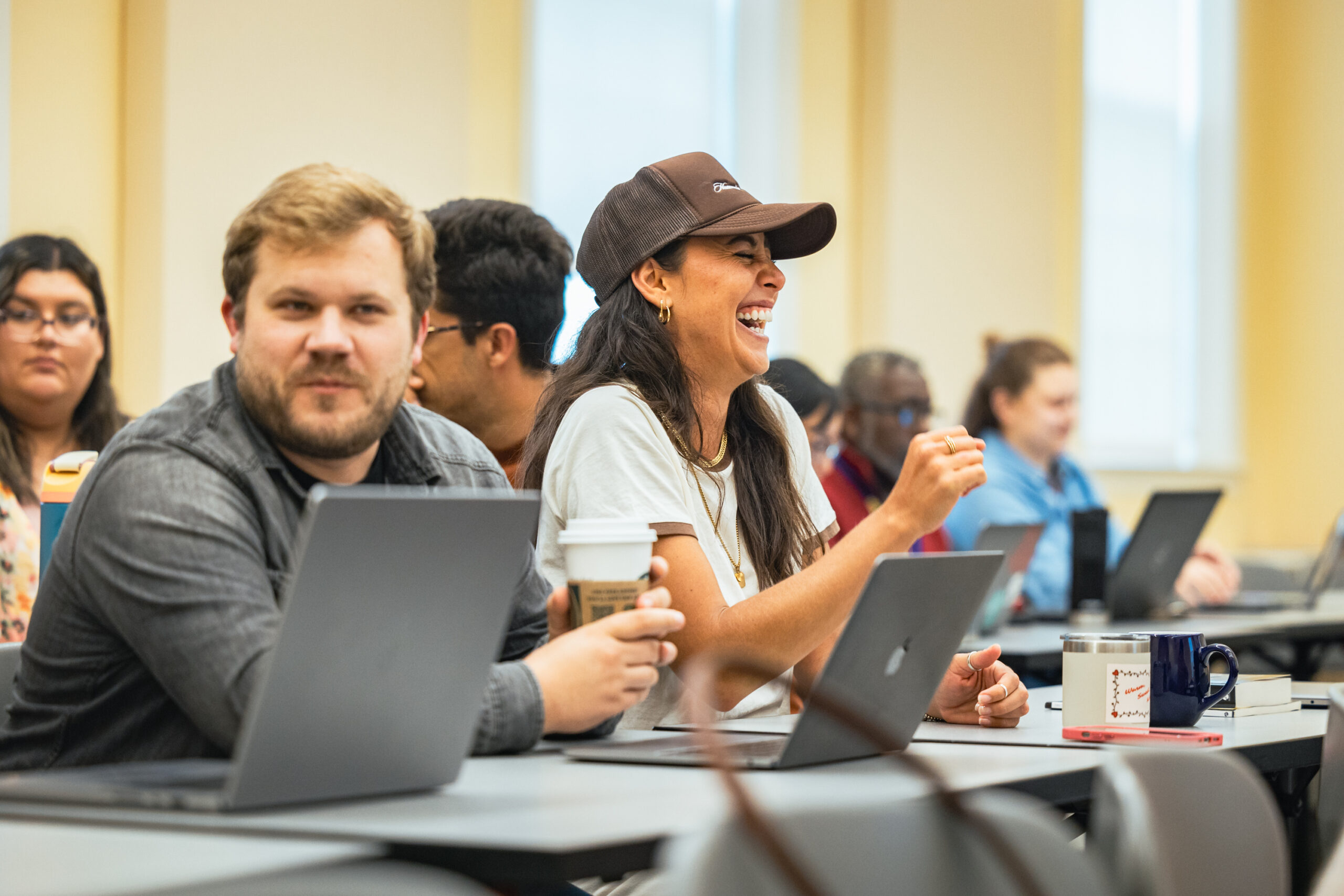 seminary students laugh before class