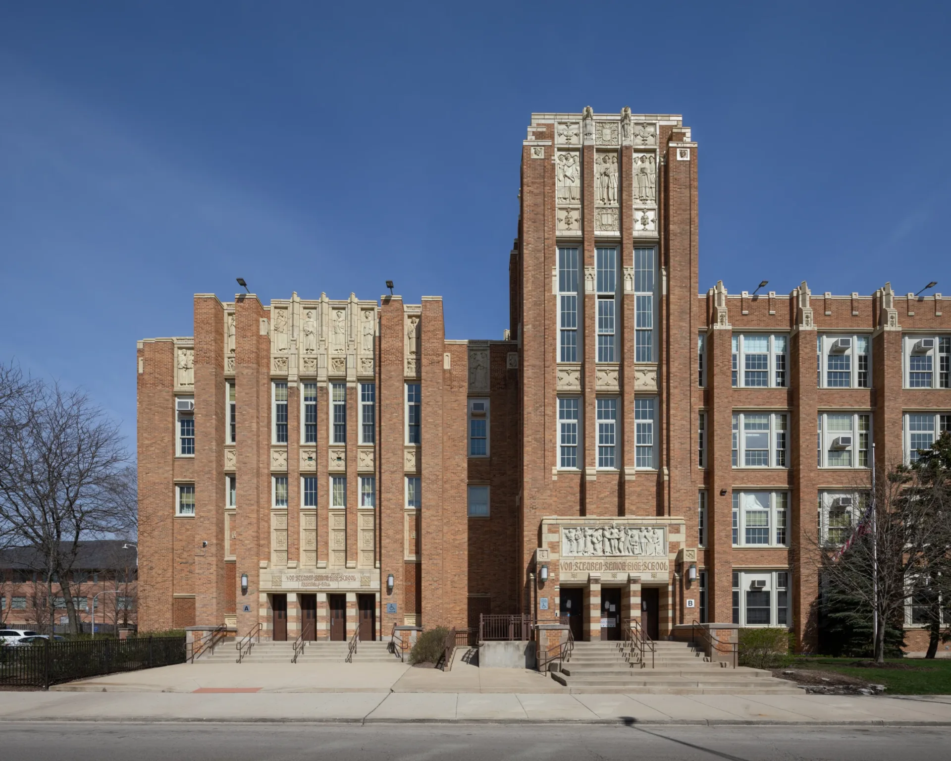 exterior building shot of brown brick Chicago high school