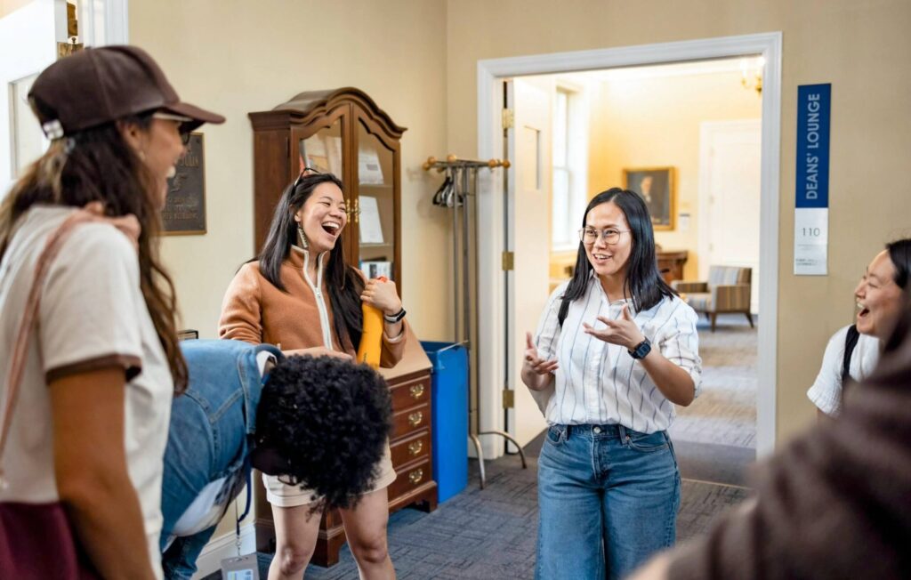 NPTS students laugh together in Nyvall Hall lobby