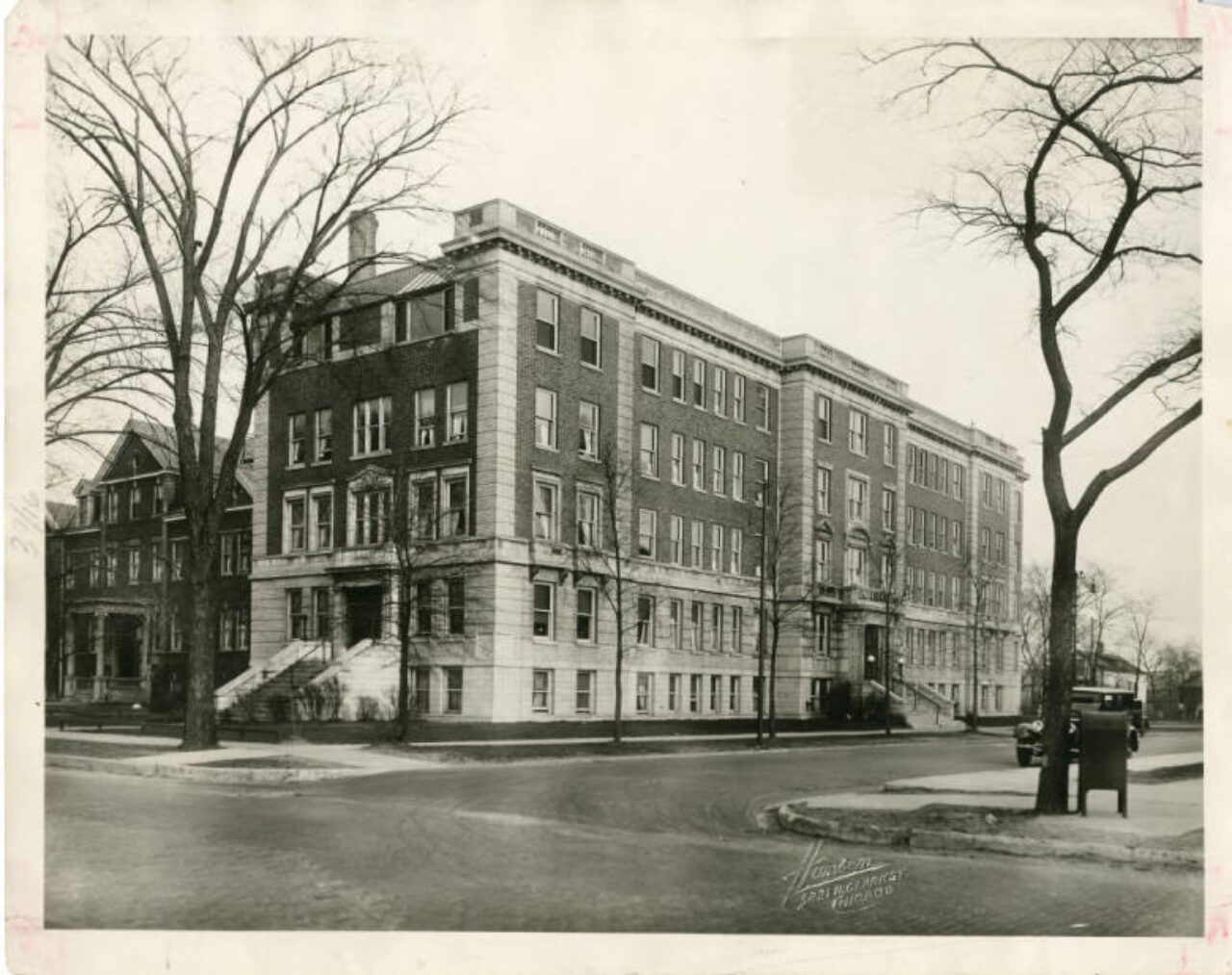 Sepia photograph of a brick and concrete hospital building