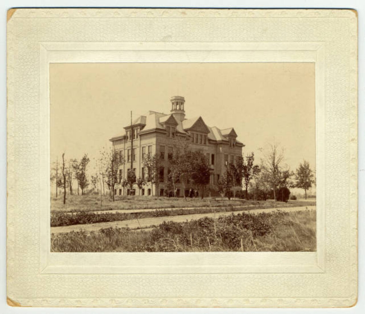 Sepia-toned photograph of a large university building
